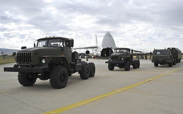 Military vehicles and equipment, parts of the S-400 defense systems, are seen on the tarmac, after they were unloaded from a Russian transport aircraft, at Murted military airport in Ankara, Turkey, Friday, July 12, 2019. (Turkish Defence Ministry via AP, Pool) Military vehicles and equipment, parts of the S-400 defense systems, are seen on the tarmac, after they were unloaded from a Russian transport aircraft, at Murted military airport in Ankara, Turkey, Friday, July 12, 2019. (Turkish Defence Ministry via AP, Pool)