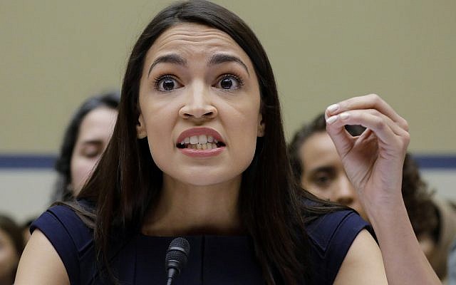 Alexandria Ocasio-Cortez, Democrat -New York, gestures while testifying before the House Oversight Committee hearing on family separation and detention centers, on Capitol Hill in Washington, July 12, 2019. (Pablo Martinez Monsivais/AP) Alexandria Ocasio-Cortez, Democrat -New York, gestures while testifying before the House Oversight Committee hearing on family separation and detention centers, on Capitol Hill in Washington, July 12, 2019. (Pablo Martinez Monsivais/AP)