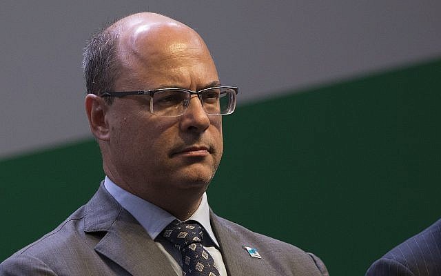 In this January 3, 2019 file photo, Rio de Janeiro Governor Wilson Witzel attends the swearing-in ceremony for the new president of state-run oil company Petrobras, Roberto Castello Branco, in Rio de Janeiro, Brazil. (AP Photo/Leo Correa, File) In this January 3, 2019 file photo, Rio de Janeiro Governor Wilson Witzel attends the swearing-in ceremony for the new president of state-run oil company Petrobras, Roberto Castello Branco, in Rio de Janeiro, Brazil. (AP Photo/Leo Correa, File)