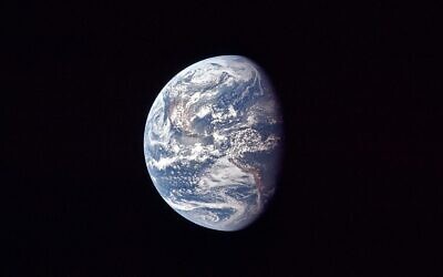 The Earth, as the Apollo 11 mission traveled towards the moon, July 17, 1969. (NASA via AP/File)
