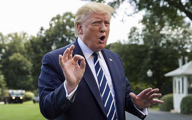 US President Donald Trump speaks with reporters on the South Lawn of the White House before departing, July 19, 2019, in Washington. (AP Photo/Alex Brandon) US President Donald Trump speaks with reporters on the South Lawn of the White House before departing, July 19, 2019, in Washington. (AP Photo/Alex Brandon)
