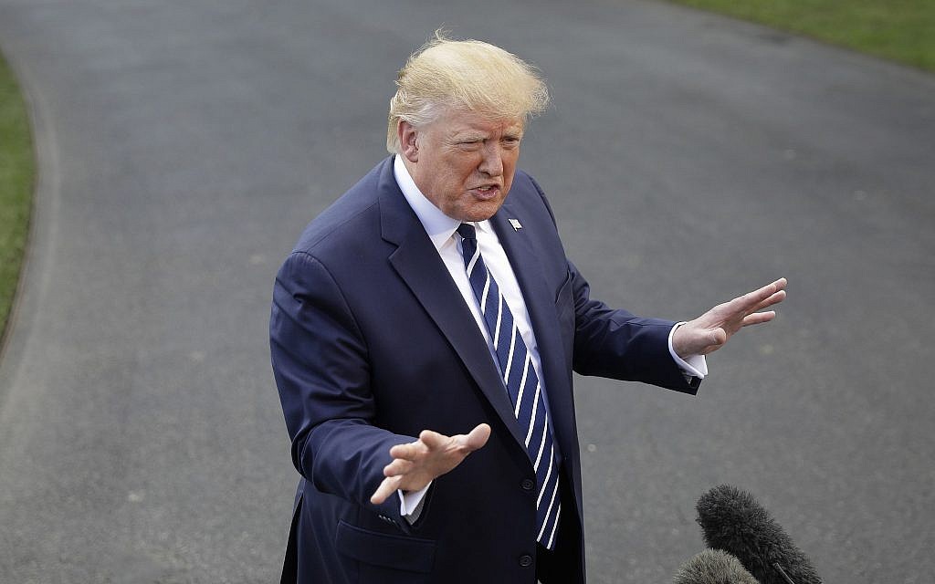 US President Donald Trump speaks to members of the media before boarding Marine One helicopter on the South Lawn of the White House in Washington, for the short flight to nearby Andrews Air Force Base, Maryland, July 19, 2019. (AP Photo/Pablo Martinez Monsivais) US President Donald Trump speaks to members of the media before boarding Marine One helicopter on the South Lawn of the White House in Washington, for the short flight to nearby Andrews Air Force Base, Maryland, July 19, 2019. (AP Photo/Pablo Martinez Monsivais)
