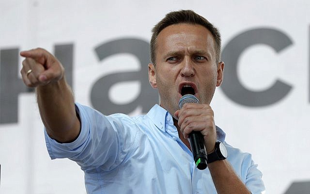 Russian opposition activist Alexei Navalny gestures while speaking to a crowd during a political protest in Moscow, Russia, Saturday, July 20, 2019. (AP Photo/Pavel Golovkin) Russian opposition activist Alexei Navalny gestures while speaking to a crowd during a political protest in Moscow, Russia, Saturday, July 20, 2019. (AP Photo/Pavel Golovkin)
