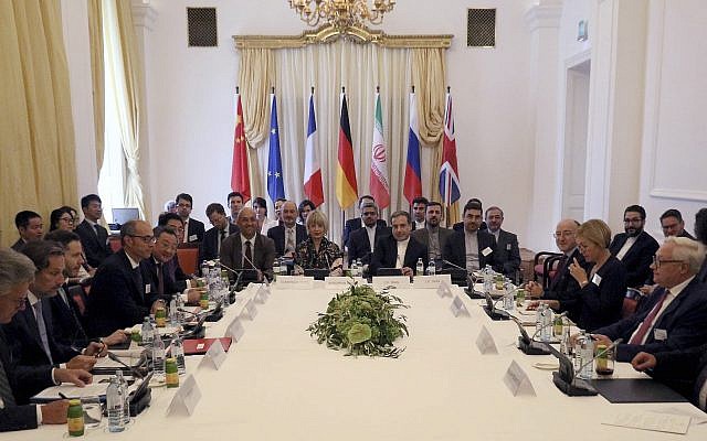 The European Union's political director Helga-Maria Schmid and Iran's deputy Foreign Minister Abbas Araghchi, center from left, wait for a bilateral meeting as part of the closed-door nuclear talks with Iran at a hotel in Vienna, Austria, July 28, 2019. (AP) The European Union's political director Helga-Maria Schmid and Iran's deputy Foreign Minister Abbas Araghchi, center from left, wait for a bilateral meeting as part of the closed-door nuclear talks with Iran at a hotel in Vienna, Austria, July 28, 2019. (AP)