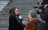 Hungarian philosopher Agnes Heller is interviewed by German Deutsche Welle TV company during an anti-goverment demonstration in front of the Hungarian Parliament building in Budapest, Hungary, Sunday, Feb. 1, 2015. (AP/MTI,Zoltan Mathe)
