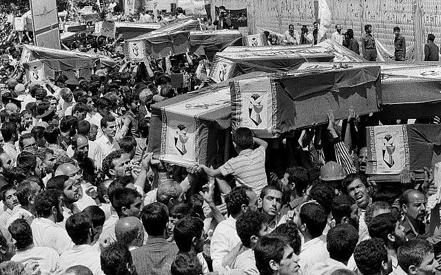 Mourners carry coffins through the streets of Tehran during a mass funeral for the victims aboard Iran Air Flight 655, which was shot down by the USS Vincennes in the Persian Gulf, July 7, 1988 (AP Photo/CP) Mourners carry coffins through the streets of Tehran during a mass funeral for the victims aboard Iran Air Flight 655, which was shot down by the USS Vincennes in the Persian Gulf, July 7, 1988 (AP Photo/CP)