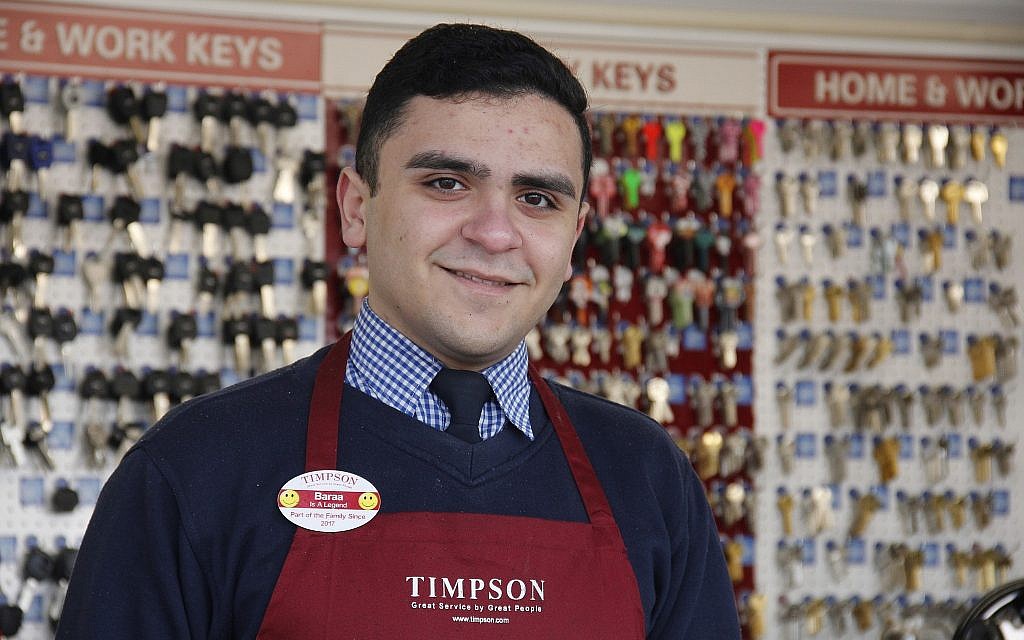 This graduate of World Jewish Relief's STEP program now works at UK retailer Timpson. (Courtesy)