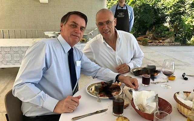Israeli ambassador Yossi Shelley (R) and Brazilian President Jair Bolsonaro eat lunch in Brasilia on July 7, 2019. (Israeli embassy in Brazil) Israeli ambassador Yossi Shelley (R) and Brazilian President Jair Bolsonaro eat lunch in Brasilia on July 7, 2019. (Israeli embassy in Brazil)
