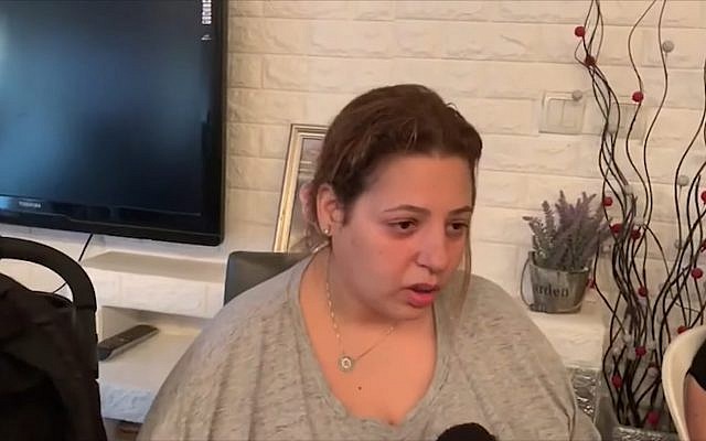Screen capture from video of Dikla Hasadai whose husband Ofir was shot dead apparently in a dispute over a parking spot in Ramle, July 28, 2019. (Ynet) Screen capture from video of Dikla Hasadai whose husband Ofir was shot dead apparently in a dispute over a parking spot in Ramle, July 28, 2019. (Ynet)
