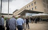 People gather outside the Foreign Ministry building in Jerusalem, November 15, 2018. (Yonatan Sindel/Flash90)