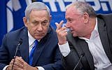 Prime Minister Benjamin Netanyahu (L) talks with then-coalition chairman MK David Amsalem during a Likud party faction meeting at the Knesset on November 19, 2018. (Miriam Alster/Flash90)
