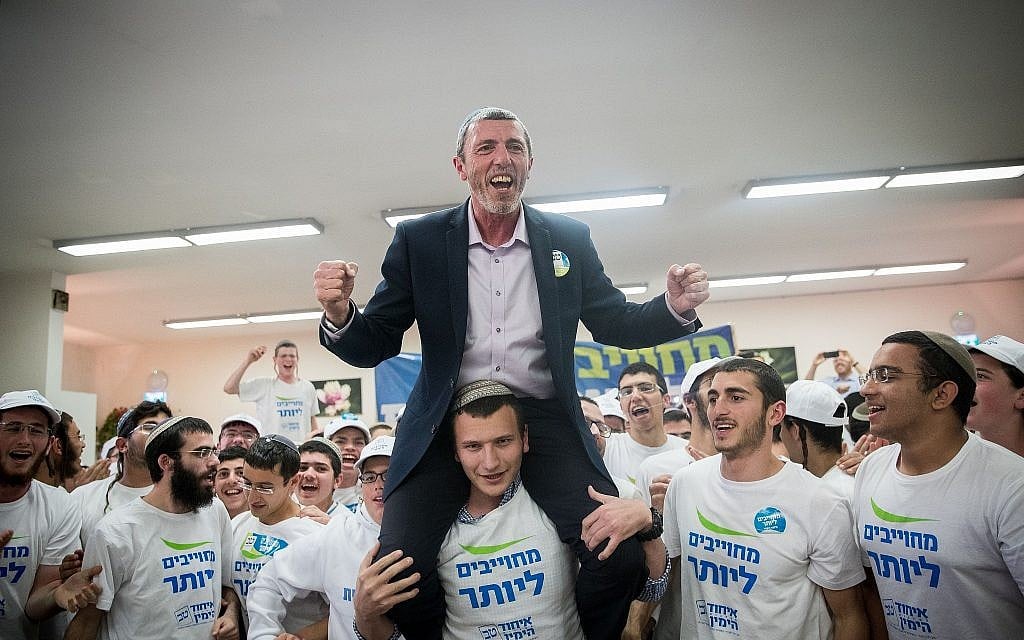 Rafi Peretz, leader of the Jewish Home party, dances with activists of the Union of Right-Wing Parties in Jerusalem, April 8, 2019 (Yonatan Sindel/Flash90) Rafi Peretz, leader of the Jewish Home party, dances with activists of the Union of Right-Wing Parties in Jerusalem, April 8, 2019 (Yonatan Sindel/Flash90)