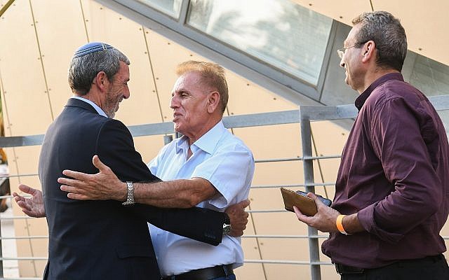 URWP chairman Rafi Peretz (L) arrives at a gathering of the Jewish Home party in Ramat Gan on June 19, 2019. (Yehuda Haim/Flash90) URWP chairman Rafi Peretz (L) arrives at a gathering of the Jewish Home party in Ramat Gan on June 19, 2019. (Yehuda Haim/Flash90)