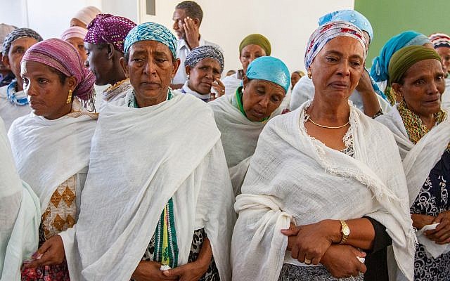 Family and friends mourn at the funeral of Solomon Tekah, in Kiryat Haim, on July 2, 2019 (Yonatan Sindel/Flash90) Family and friends mourn at the funeral of Solomon Tekah, in Kiryat Haim, on July 2, 2019 (Yonatan Sindel/Flash90)