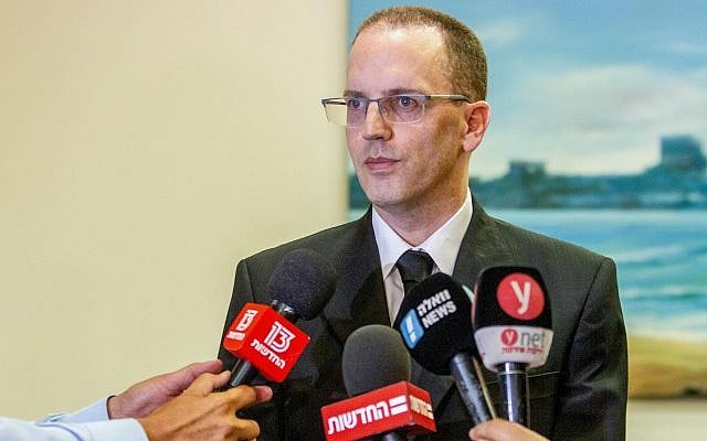 Yair Nadashi, attorney of the policeman who shot and killed 19-year-old Ethiopian, Solomon Tekah, gives a statement to the media at his office in Haifa, July 4, 2019. (Flash90) Yair Nadashi, attorney of the policeman who shot and killed 19-year-old Ethiopian, Solomon Tekah, gives a statement to the media at his office in Haifa, July 4, 2019. (Flash90)