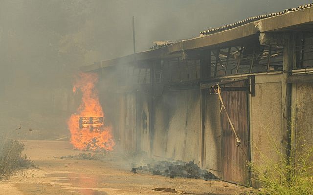 A building burning in the West Bank settlement of Shavei Shomron, July 17, 2019. (Sraya Diamant/Flash90)