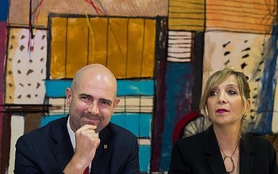 Justice Minister Amir Ohana (L) with then-Justice Ministry director general Emi Palmor during a welcome ceremony for Ohana at the ministry in Jerusalem on June 23, 2019. (Yonatan Sindel/Flash90)