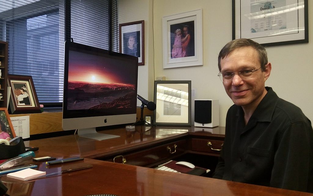 Prof. Avi Loeb in his Harvard office. His computer wallpaper features a photo of Proxima Centauri, the closest known star to our Sun. (Rich Tenorio/Times of Israel) Prof. Avi Loeb in his Harvard office. His computer wallpaper features a photo of Proxima Centauri, the closest known star to our Sun. (Rich Tenorio/Times of Israel)