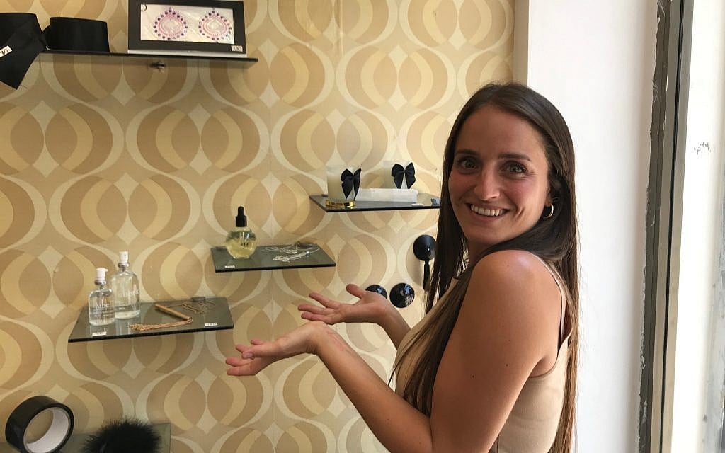 Chana Boteach posing in front of some accessories at her Kosher Sex store in Tel Aviv, July 10, 2019. (Shoshanna Solomon/Times of Israel) Chana Boteach posing in front of some accessories at her Kosher Sex store in Tel Aviv, July 10, 2019. (Shoshanna Solomon/Times of Israel)