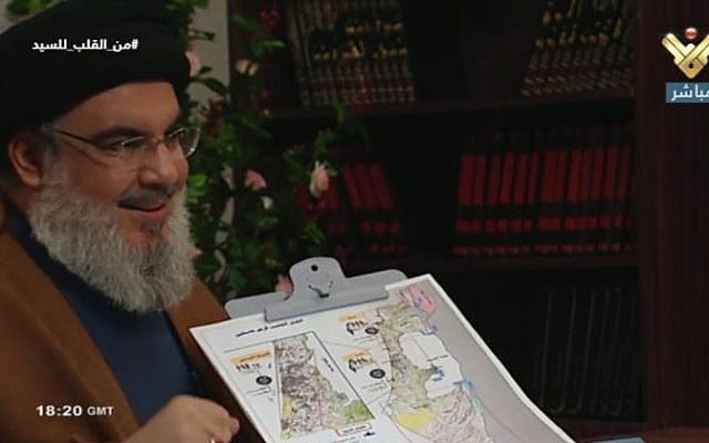 Hezbollah leader Sheikh Hassan Nasrallah points to a map of Israel, and specifies potential targets, in a July 12, 2019, TV interview. (Channel 13 screenshot) Hezbollah leader Sheikh Hassan Nasrallah points to a map of Israel, and specifies potential targets, in a July 12, 2019, TV interview. (Channel 13 screenshot)