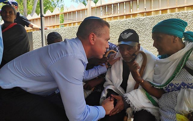 Public Security Minister Gilad Erdan consoles the family of Solomon Tekah, 19, who was shot dead by an off-duty police officer, sparking riots, July 4, 2019 (courtesy) Public Security Minister Gilad Erdan consoles the family of Solomon Tekah, 19, who was shot dead by an off-duty police officer, sparking riots, July 4, 2019 (courtesy)