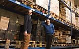 Pieter van Oordt, right, with his brother Roger at the Israel Products Center in Nijkerk, the Netherlands, Feb. 19, 2016. (Cnaan Liphshiz/JTA)