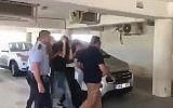 Screen capture from video of Israeli suspects in the alleged gang-rape of a British tourist in Cyprus being brought for a remand hearing at a Cypriot court, July 18, 2019. (Walla)