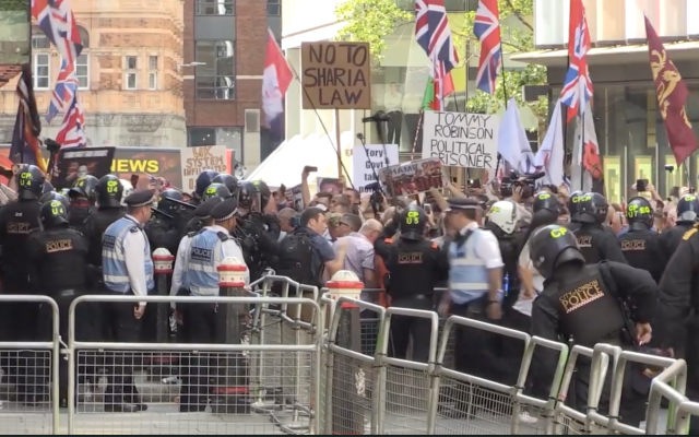 Far-right protesters demonstrate in London against jailing of Tommy Robinson on July 10, 2019. (Screen capture/The Independent) Far-right protesters demonstrate in London against jailing of Tommy Robinson on July 10, 2019. (Screen capture/The Independent)