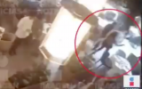Security camera footage shows a woman who appears to be Esperanza Gutierrez Rojano holding a pistol before shooting Israelis Ben Suthi and Alon Azoulay in Mexico City on July 24, 2019. (Screen capture: Twitter)