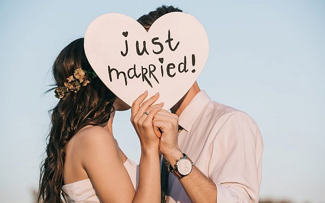 Illustrative image of a bride and groom. (LightFieldStudios/ iStock by Getty Images) Illustrative image of a bride and groom. (LightFieldStudios/ iStock by Getty Images)