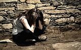 Illustrative: A young female victim of violence (Tunatura; iStock by Getty Images)