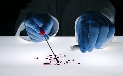 Illustrative image of forensic evidence being gathered at a crime scene (natasaadzic; iStock by Getty Images)