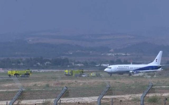 An Electra Air Boeing 737 plane after a safe landing at Ben Gurion Airport amid an emergency situation because of a blown tire. (Channel 12 screen capture) An Electra Air Boeing 737 plane after a safe landing at Ben Gurion Airport amid an emergency situation because of a blown tire. (Channel 12 screen capture)