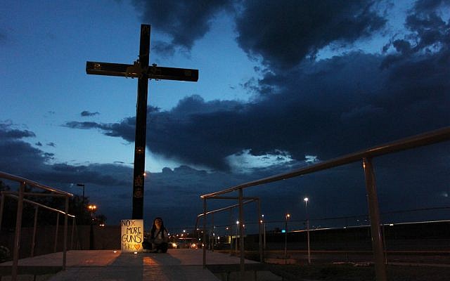 A child takes part in a vigil in Ciudad Juarez, Chihuahua state, on August 03, 2019, after a mass shooting which left 20 people dead on in El Paso, Texas, United States. (HERIKA MARTINEZ / AFP) A child takes part in a vigil in Ciudad Juarez, Chihuahua state, on August 03, 2019, after a mass shooting which left 20 people dead on in El Paso, Texas, United States. (HERIKA MARTINEZ / AFP)
