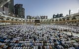 Mulism pilgrims perform prayers around the Kaaba, Islam's holiest shrine, at the Grand Mosque in Saudi Arabia's holy city of Mecca on August 7, 2019, prior to the start of the annual Hajj pilgrimage in the holy city.  (Abdel Ghani Bashir/ AFP)