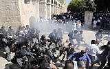 Israeli security forces clash with Muslim worshipers at the Temple Mount compound in the Old City of Jerusalem on August 11, 2019. (Ahmad Gharabli/AFP)