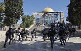 Israeli security forces clash with Muslim worshipers at the Temple Mount compound in the Old City of Jerusalem on August 11, 2019. (Ahmad Gharabli/AFP)