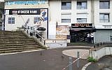 French policemen stand in front of the eatery where a waiter was shot dead by a customer allegedly angry at having to wait for a sandwich, in the eastern Paris suburb of Noisy-le-Grand on August 17, 2019. (Tiphaine LE LIBOUX / AFP)