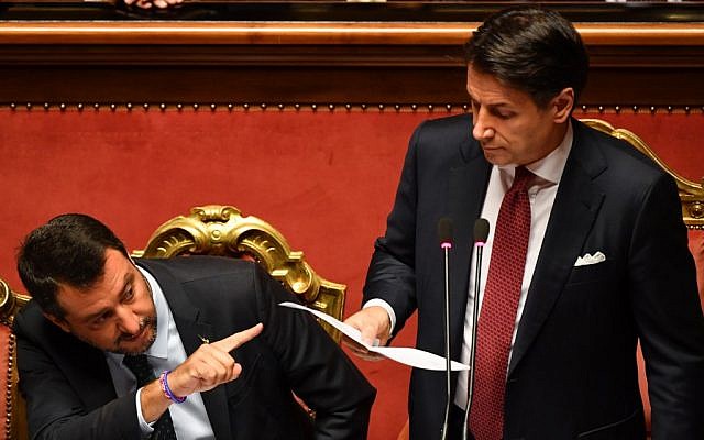 Italian Prime Minister Giuseppe Conte (R), flanked by Deputy Prime Minister and Interior Minister Matteo Salvini (L), delivers a speech at the Italian Senate in Rome on August 20, 2019, as the country faces a political crisis. (Andreas Solaro/AFP) Italian Prime Minister Giuseppe Conte (R), flanked by Deputy Prime Minister and Interior Minister Matteo Salvini (L), delivers a speech at the Italian Senate in Rome on August 20, 2019, as the country faces a political crisis. (Andreas Solaro/AFP)