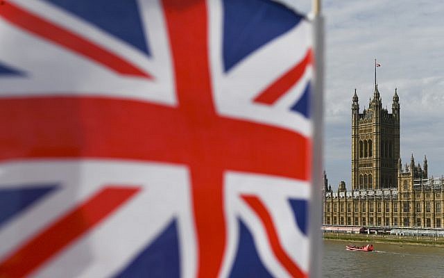 The Palace of Westminster housing the Houses of Parliament is seen from Westminster Bridge with a Union Flag in the foreground in central London on August 28, 2019. (Photo by DANIEL LEAL-OLIVAS / AFP) The Palace of Westminster housing the Houses of Parliament is seen from Westminster Bridge with a Union Flag in the foreground in central London on August 28, 2019. (Photo by DANIEL LEAL-OLIVAS / AFP)