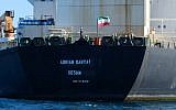 In this photo from August 18, 2019, an Iranian flag flutters on board the Adrian Darya oil tanker, formerly known as Grace 1, off the coast of Gibraltar. (Johnny Bugeja/AFP)