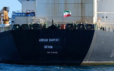 In this photo from August 18, 2019, an Iranian flag flutters on board the Adrian Darya oil tanker, formerly known as Grace 1, off the coast of Gibraltar. (Johnny Bugeja/AFP)