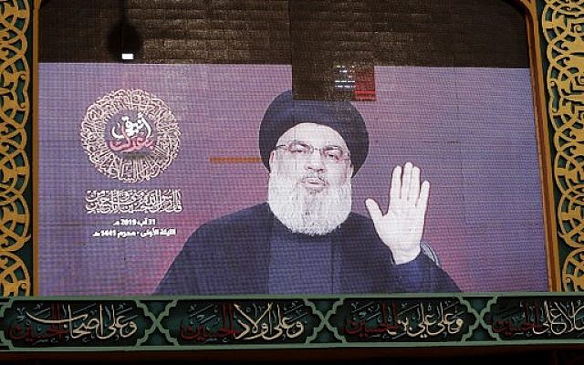 A speech by Hezbollah chief Hassan Nasrallah is transmitted on a large screen in Beirut's southern suburbs on August 31, 2019. (Anwar Amro/AFP) A speech by Hezbollah chief Hassan Nasrallah is transmitted on a large screen in Beirut's southern suburbs on August 31, 2019. (Anwar Amro/AFP)