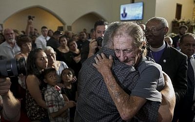 Antonio Basco greets well wishers at a public memorial for his late wife Margie Reckar, on August 16, 2019, in El Paso, Texas. Reckard was one of 22 killed during the Walmart shooting in El Paso on August 3rd. (Sandy Huffaker/ Getty Images/ AFP)