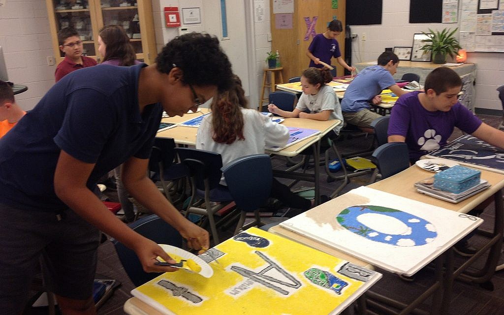 Students at Hershorin Schiff Community Day School in Sarasota, Florida create panels for the periodic table of elements. (Ben Sales/JTA)