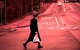 A Hasidic youth crossing a street in Monsey, Rockland County, New York on April 5, 2019. (Johannes Eisele/AFP/Getty Images)