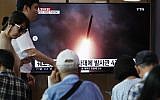 People watch a TV showing an image of North Korea's multiple rocket launch during a news program at the Seoul Railway Station, in Seoul, South Korea, August 1, 2019. (AP Photo/Ahn Young-joon)