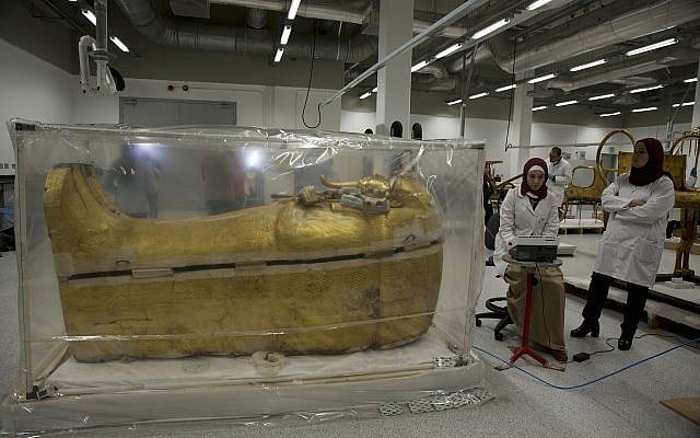 The gold-covered sarcophagus of King Tutankhamun is encased in a tent for restoration procedures at the conservation center of the the Grand Egyptian Museum in Giza, near Cairo, Egypt, August 4, 2019. (AP Photo/Maya Alleruzzo) The gold-covered sarcophagus of King Tutankhamun is encased in a tent for restoration procedures at the conservation center of the the Grand Egyptian Museum in Giza, near Cairo, Egypt, August 4, 2019. (AP Photo/Maya Alleruzzo)