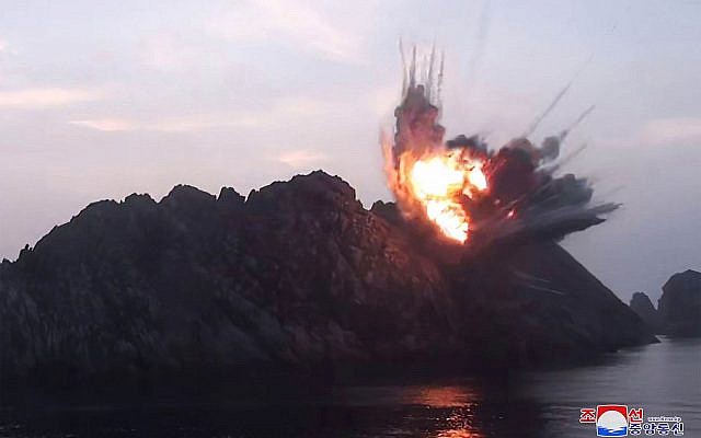 This August 6, 2019, photo provided by the North Korean government shows what it says is a new-type tactical guided missile launched from an airfield in the western area of North Korea landing in an islet in waters off the country's eastern coast (Korean Central News Agency/Korea News Service via AP) This August 6, 2019, photo provided by the North Korean government shows what it says is a new-type tactical guided missile launched from an airfield in the western area of North Korea landing in an islet in waters off the country's eastern coast (Korean Central News Agency/Korea News Service via AP)