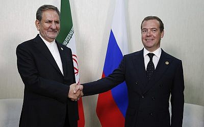 Russian Prime Minister Dmitry Medvedev, right, and Iranian Vice President Eshaq Jahangiri at the First Caspian Economic Forum in Turkmenbashi, Turkmenistan, August 12, 2019. (Dmitry Astakhov, Sputnik, Government Pool Photo via AP)